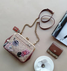 Coach F31069 X Keith Haring Kisslock Crossbody In Signature Patchwork