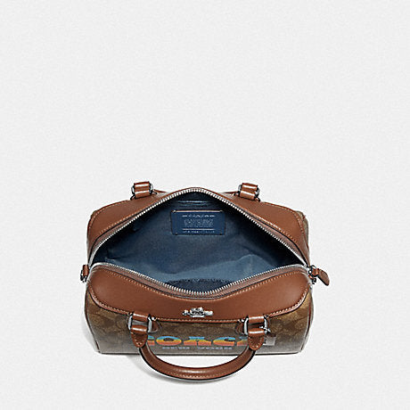 COACH®  Mini Saddle Bag Charm In Signature Canvas