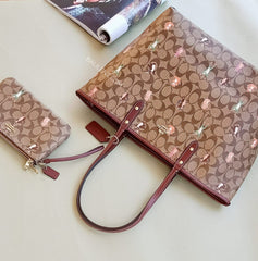 Coach F80246 Reversible Tote In Sig Canvas With Animals Print Khaki Pink Wine