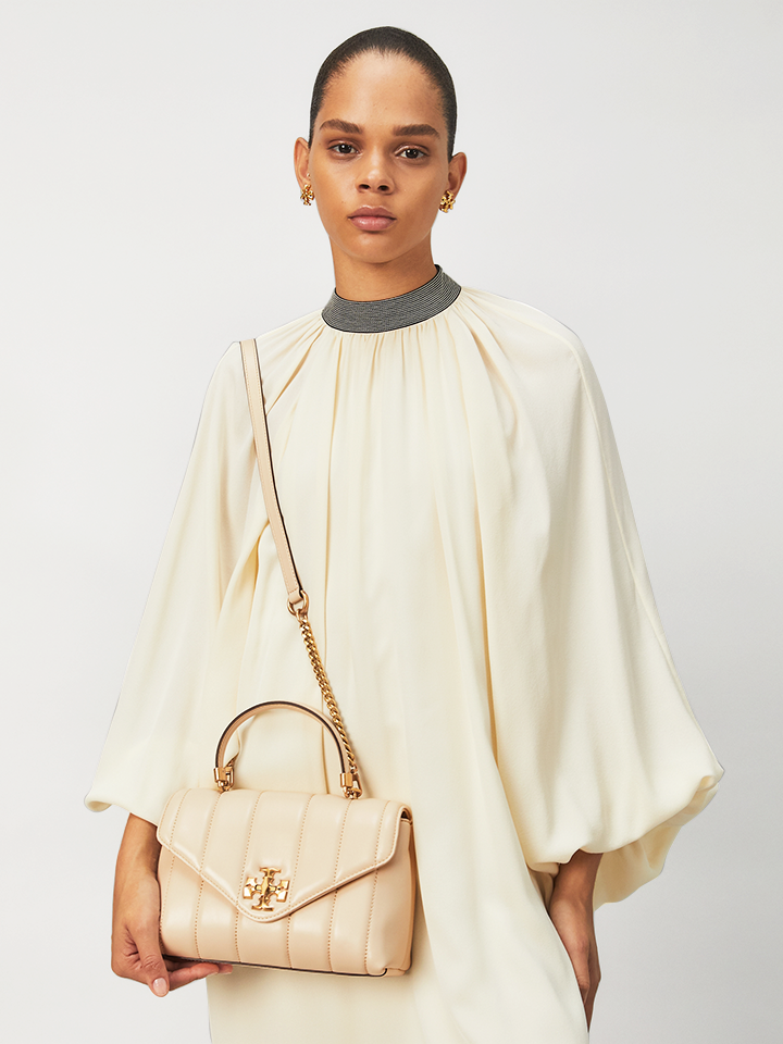 Tory-Burch-Kira-Small-Top-Handle-Satchel-Bag-Brie-Rolled-Gold-Balilene-onmodel