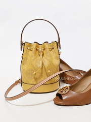 Tory-Burch-T-Monogram-Perforated-Leather-Mini-Bucket-Bag-Golden-Sunset-Balilene-detail-depan