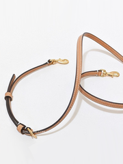 Tory-Burch-T-Monogram-Perforated-Leather-Mini-Bucket-Bag-Golden-Sunset-Balilene-detail-strap