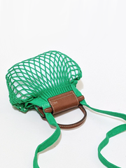 detail-bagian-belakang-Longchamp-Le-Pliage-Extra-Small-Filet-Crossbody-Bag-Green