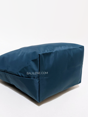detail-bawah-Longchamp-Le-Pliage-Green-Small-Top-Handle-Bag-Ocean-Blue