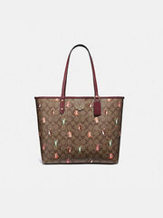 Coach F80246 Reversible Tote In Sig Canvas With Animals Print Khaki Pink Wine