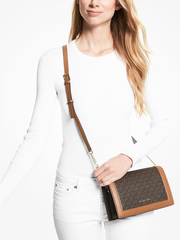 on-model-Michael-Kors-32S2GJ6C7B-Jet-Set-Large-Logo-Crossbody-Bag-Brown-Acorn