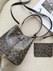 Coach-Rowan-Bucket-Bag-In-Loved-Signature-Canvas-With-Charms-Brown-balilene