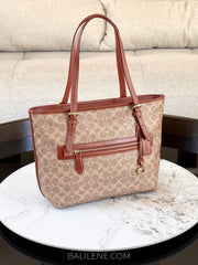 Coach-Taylor-Tote-In-Signature-Canvas-Tan-Rust-balilene