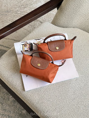 Longchamp-Le-Pliage-Original-Pouch-Brick-balilene