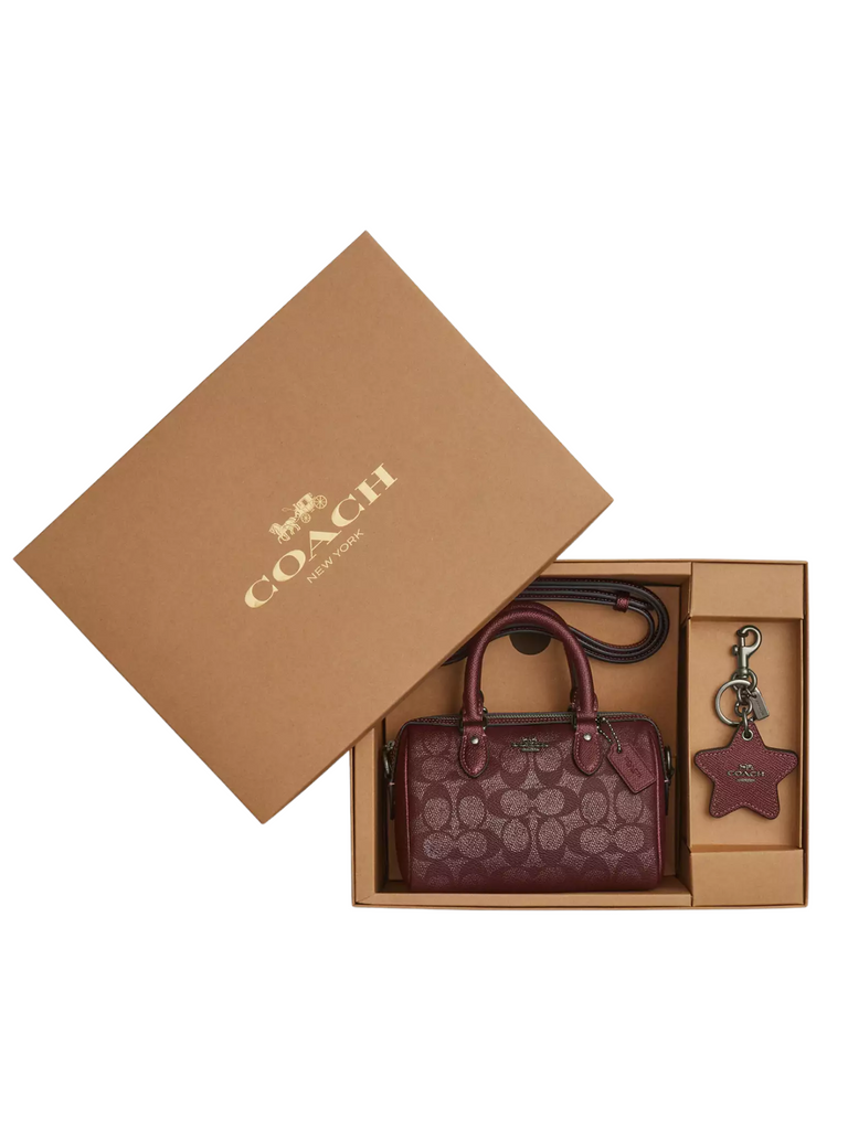 box-Coach-Boxed-Mini-Rowan-Crossbody-Bag-And-Mirror-Bag-Charm-Set-In-Signature-Canvas-Wine-Multi