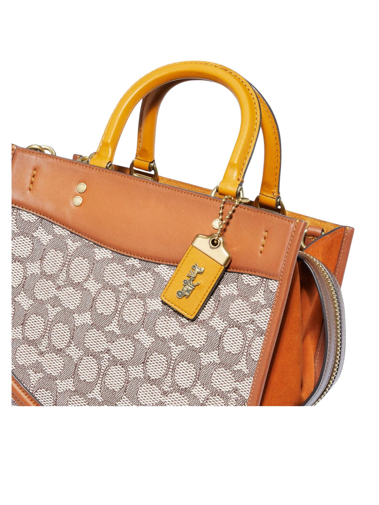 detail-Coach-Rogue-25-In-Signature-Textile-Jacquard-Cocoa-Burnished-Amber
