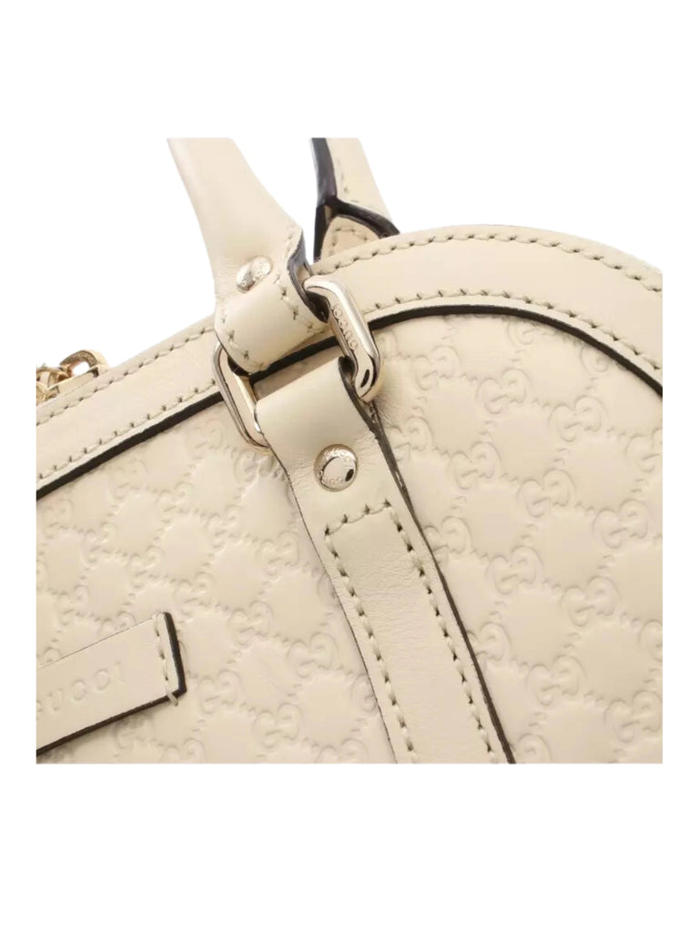 detail-Gucci-Alma-Small-GG-Guccissima-Camelia-Ivory