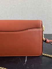 detail-belakang-Coach-Tabby-Wristlet-In-Signature-Canvas-Tan-Rust-balilene