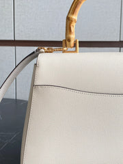 detail-belakang-Kate-Spade-Katy-Bamboo-Medium-Top-Handle-Halo-White-balilene
