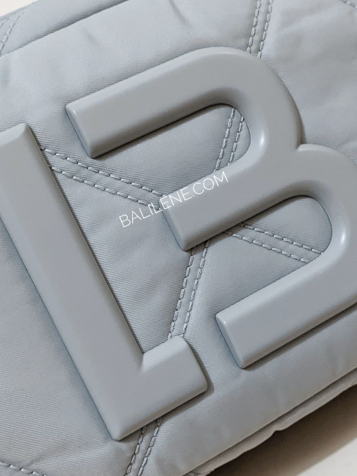 detail-depan-Bimba-Y-Lola-Nylon-Padded-Extra-Smal-Crossbody-Bag-Grey