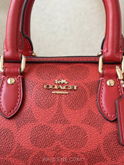 detail-depan-Coach-Mini-Rowan-Crossbody-Bag-In-Signature-Canvas-Crimson-balilene