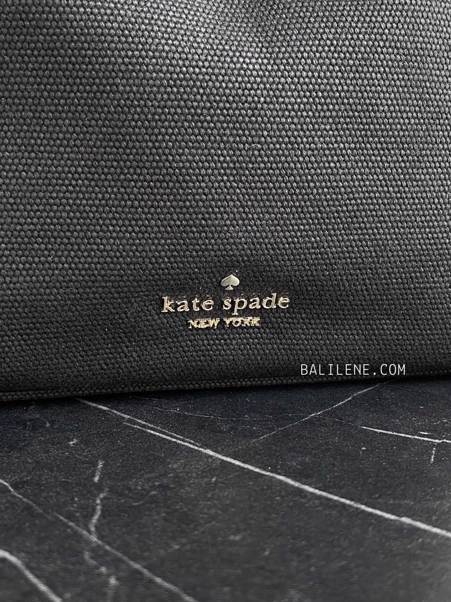 detail-depan-Kate-Spade-Kip-Canvas-Bucket-Bag-Black-balilene