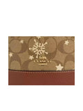 detail-logo-Coach-Dempsey-Drawstring-Bucket-Bag-15-In-Signature-Canvas-With-Snowflake-and-stars-Print-Khaki-MultiWEBP
