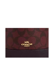 detail-logo-Coach-Dempsey-Drawstring-Bucket-Bag-in-Signature-Canvas-Leather-Oxblood-MultiWEBP