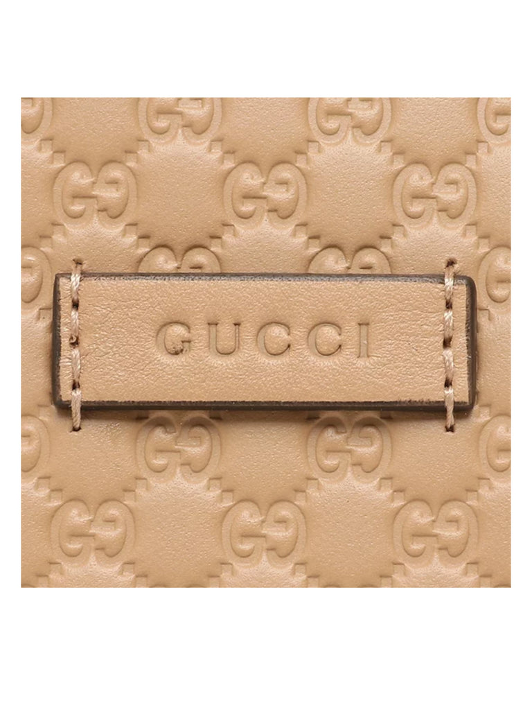 detail-logo-Gucci-Alma-Small-GG-Guccissima-Camelia-Beige
