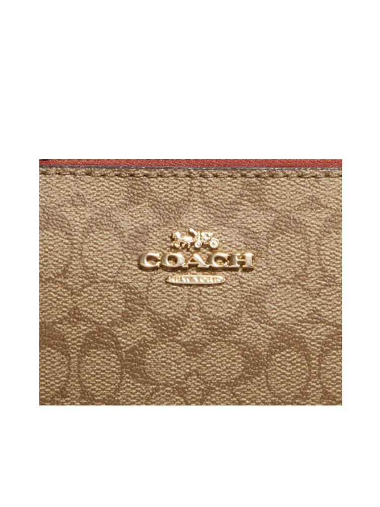 detail-logo-depan-Coach-Nolita-19-In-Colorblock-Signature-Canvas-Khaki-TerracottaWEBP