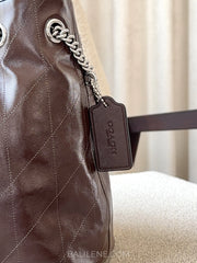 detail-samping-Coach-Evelyn-Shoulder-Bag-With-Quilting-Maple-balilene