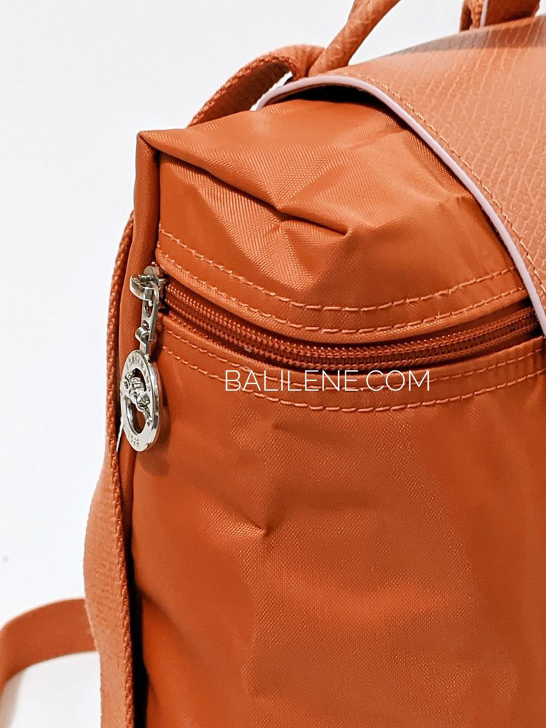 detail-samping-zip-Longchamp-Le-Pliage-Club-Backpack-Bag-Rust-Silver