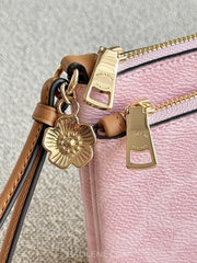 detail-zip-Coach-Double-Zip-Wallet-In-Signature-Canvas-With-Charms-Powder-Pink-balilene