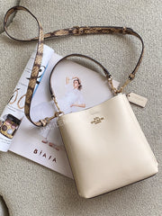 gambar-Coach-Mollie-Bucket-Bag-22-Snake-Embossed-Leather-Ivory-Multi-balilene