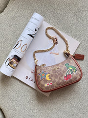 gambar-Coach-Teri-Mini-Crossbody-Bag-In-Signature-Canvas-With-Sticker-Print-Tan-Multi-balilene