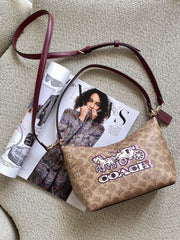 gambar-Coach-Zip-Top-Shoulder-Bag-In-Signature-Canvas-With-Horse-And-Carriage-Print-Tan-Black-Cherry-balilene
