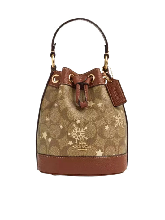 gambar-depan-Coach-Dempsey-Drawstring-Bucket-Bag-15-In-Signature-Canvas-With-Snowflake-and-stars-Print-Khaki-MultiWEBP