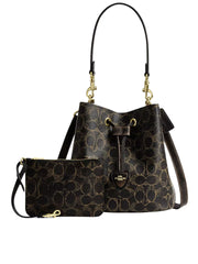 gambar-depan-Coach-Rowan-Bucket-Bag-In-Loved-Signature-Canvas-With-Charms-Brown