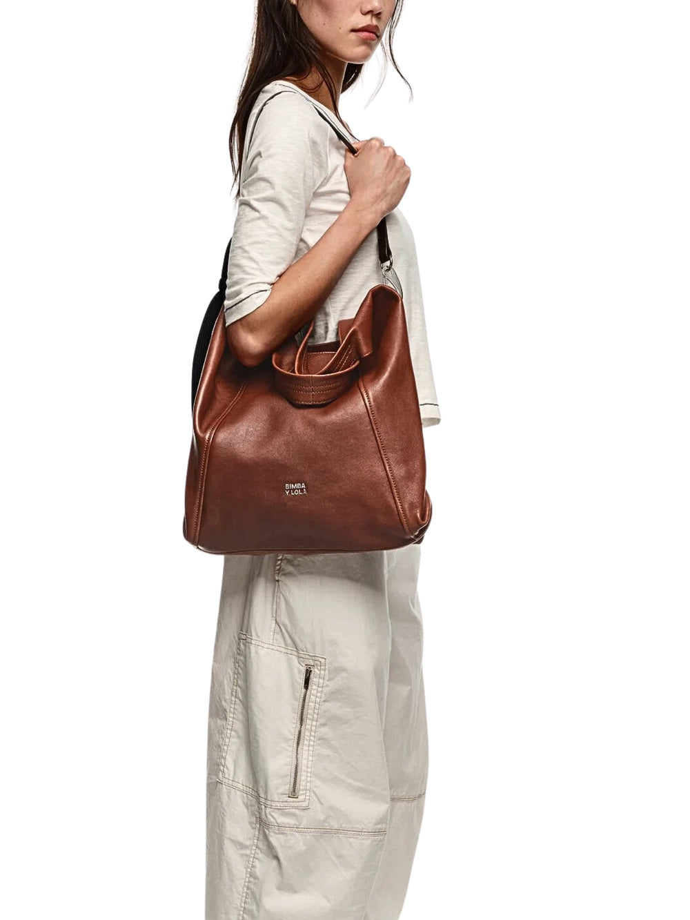 on-model-1-BYL-Large-Dark-Tan-Leather-Paper-Bag