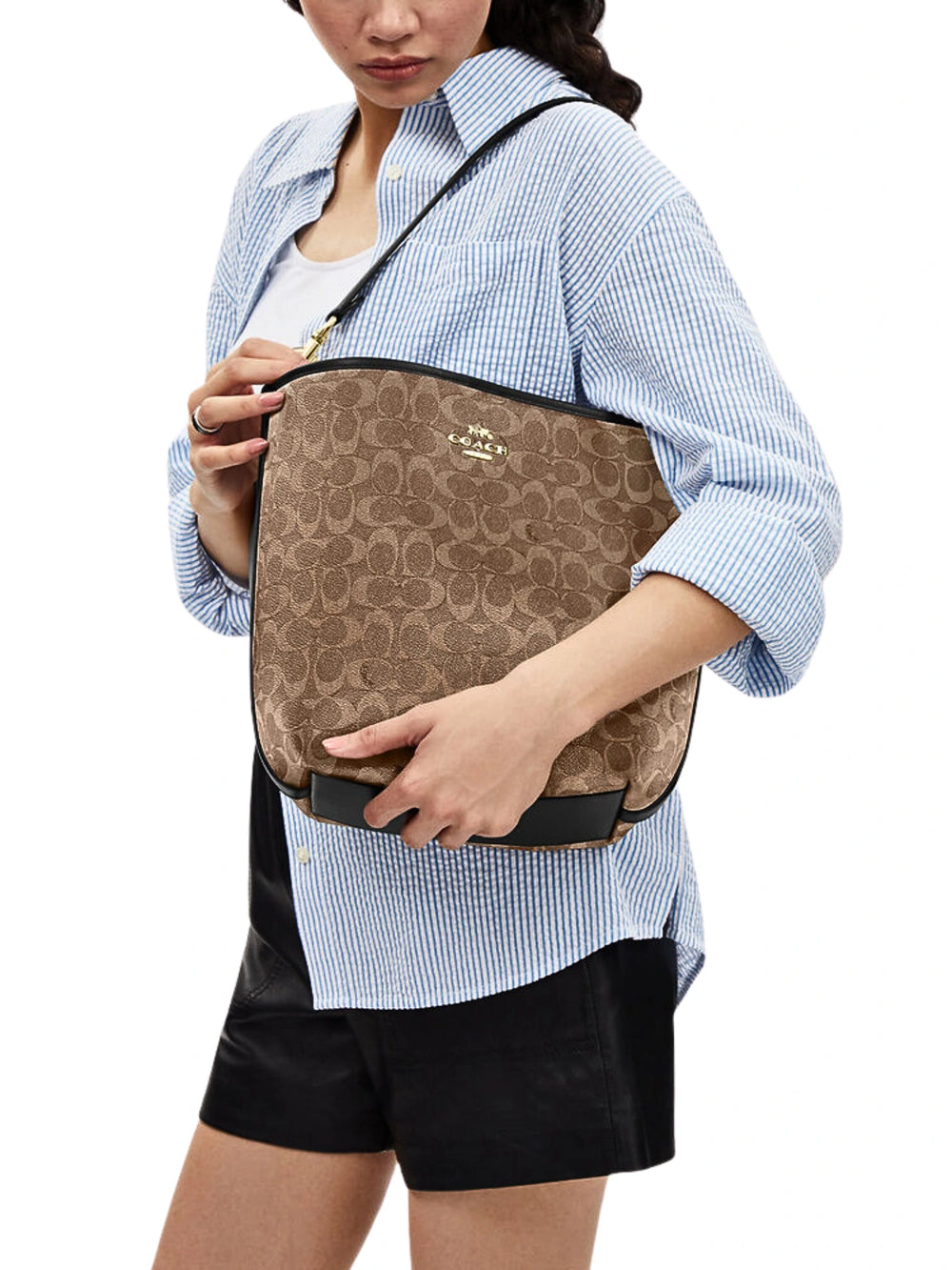 on-model-1-Coach-City-Large-Bucket-Bag-In-Signature-Canvas-Tan-Black