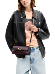 on-model-1-Coach-Jet-Shoulder-Bag-Refined-Calf-Leather-Black-Currant