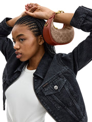 on-model-1-Coach-Jonie-Bag-In-Signature-Canvas-Tan-Rust