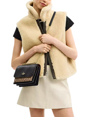 on-model-1-Coach-Klare-Crossbody-Bag-In-Signature-Canvas-Tan-Black-Multi