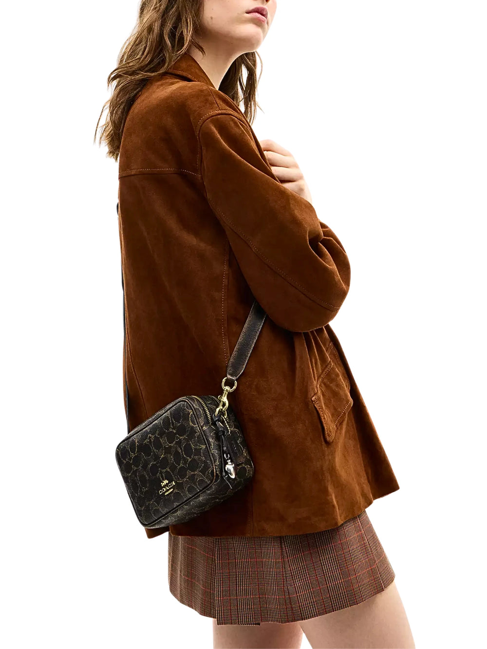 on-model-1-Coach-Mini-Carey-Crossbody-Bag-In-Loved-Signature-Canvas-Brown