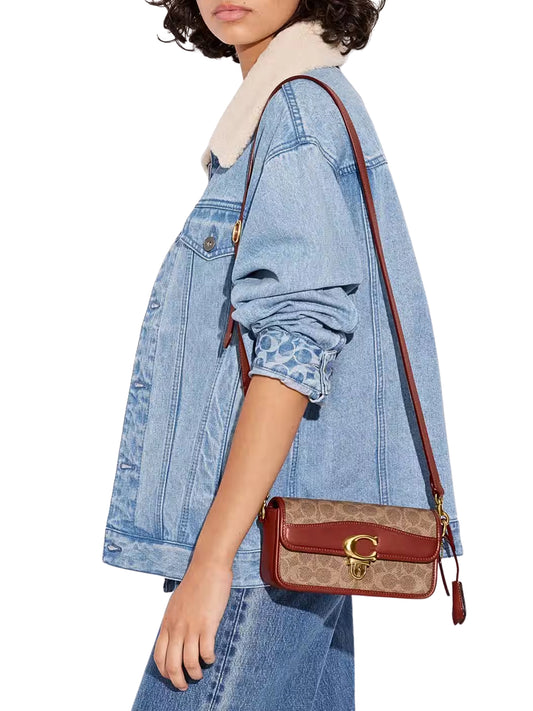 on-model-1-Coach-Studio-Baguette-Bag-In-Signature-Canvas-Tan-Rust