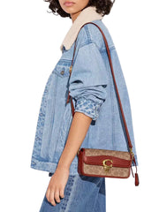 on-model-1-Coach-Studio-Baguette-Bag-In-Signature-Canvas-Tan-Rust