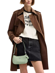 on-model-1-Coach-Teri-Mini-Crossbody-Bag-Signature-Leather-Heart-Charm-Pale-Green