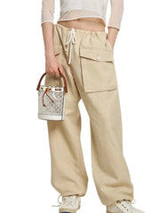 on-model-1-Tory-Burch-T-Monogram-TPU-Mini-Bucket-Bag-Clear