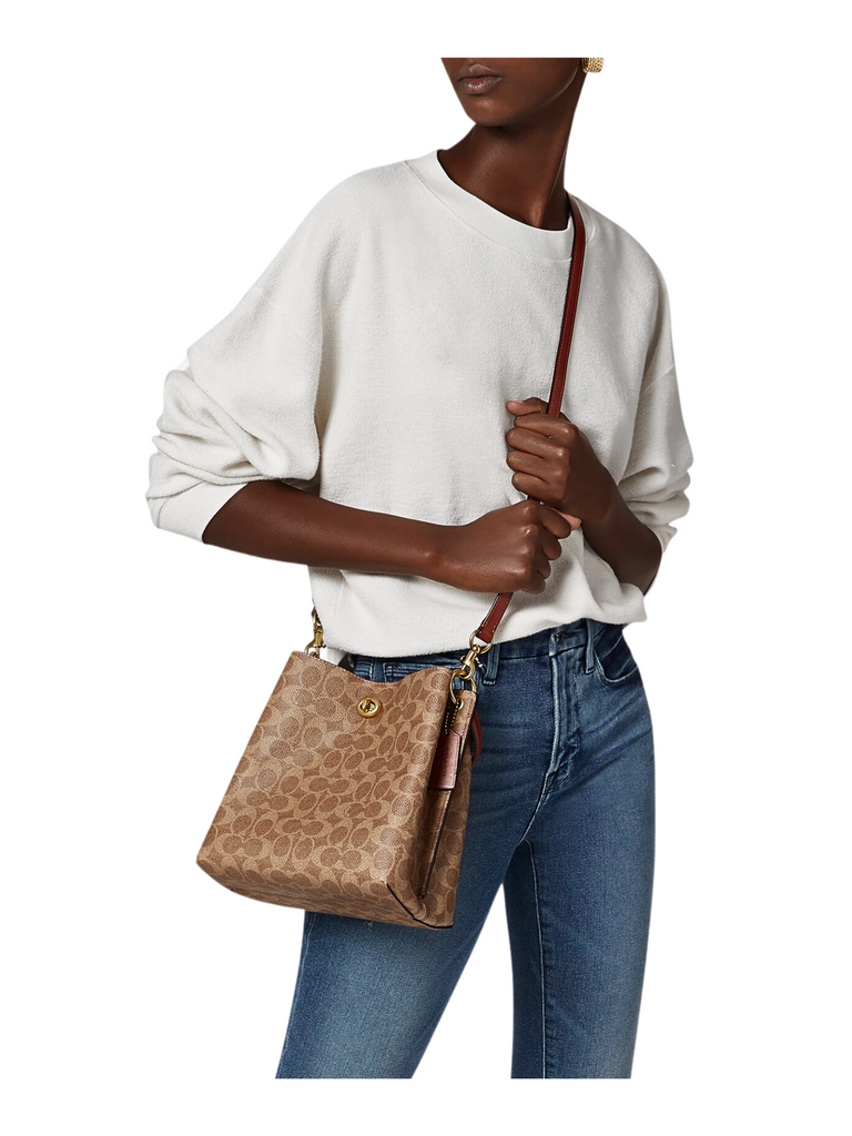 on-model-2-Coach-Charlie-Bucket-Bag-22-In-Signature-Canvas-Tan-Rust