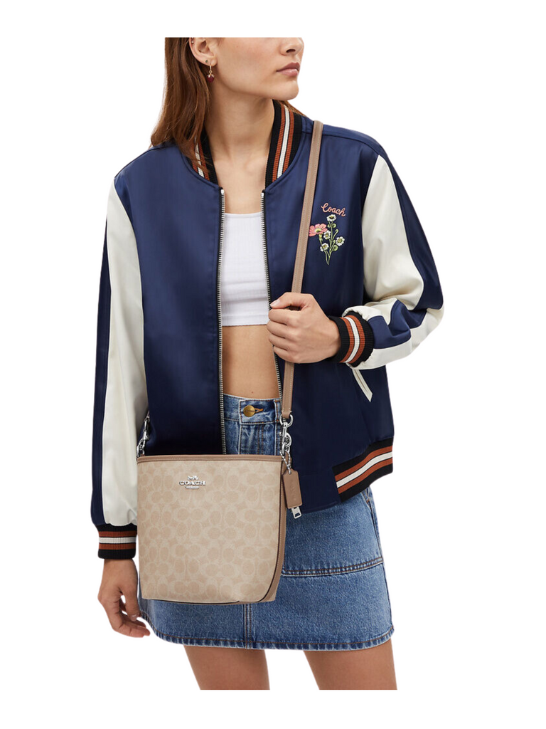 on-model-2-Coach-City-Bucket-Bag-In-Signature-Canvas-Sand-Taupe