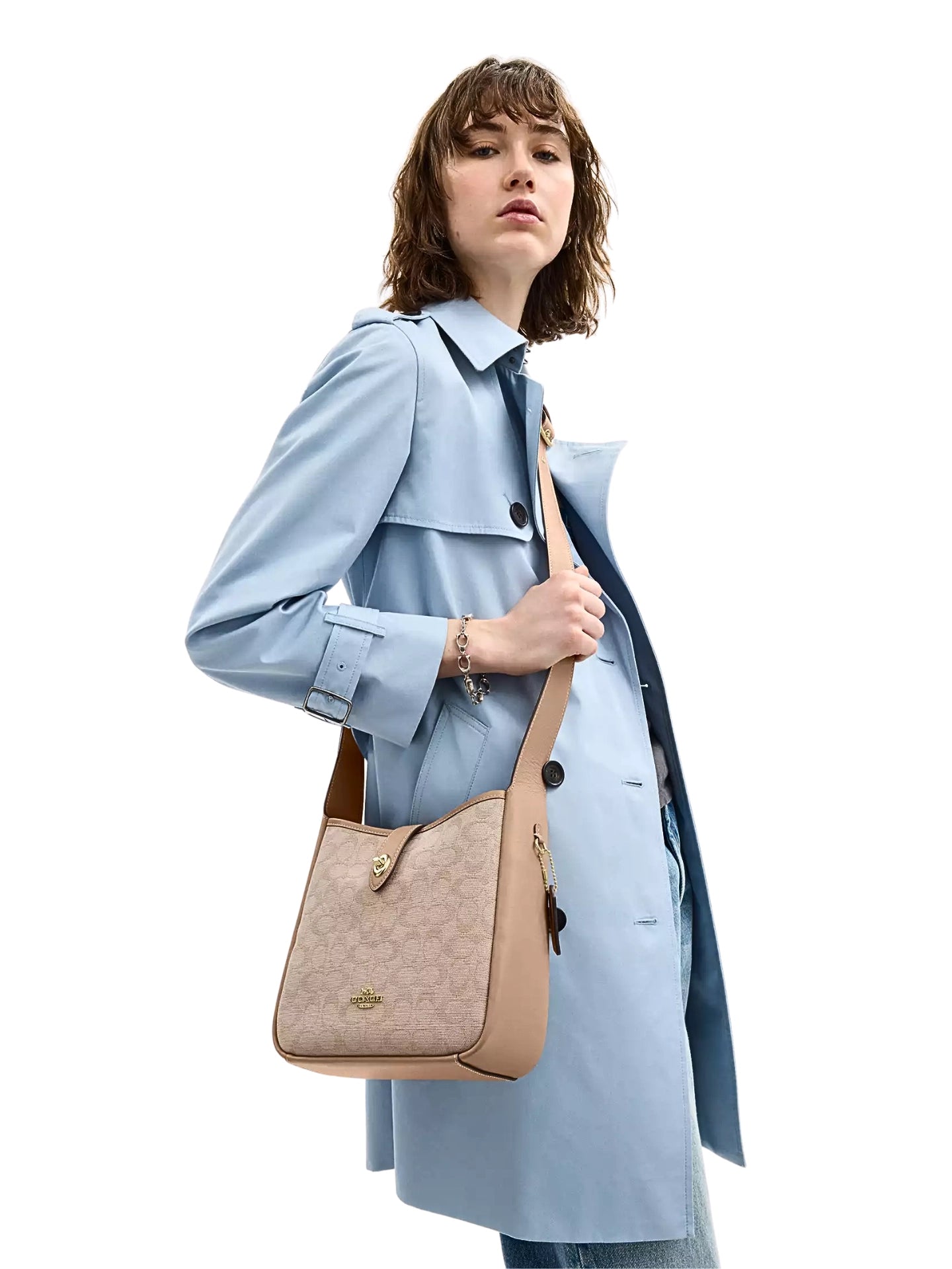 on-model-2-Coach-Hadley-Convertible-Crossbody-Bag-With-Signature-Canvas-Dark-Natural-Multi