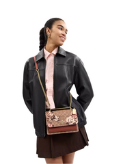 on-model-2-Coach-Klare-Crossbody-Bag-In-Signature-Canvas-With-Rose-Print-Tan-Multi