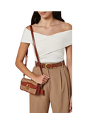 on-model-2-Coach-Studio-Baguette-Bag-In-Signature-Canvas-Tan-Rust