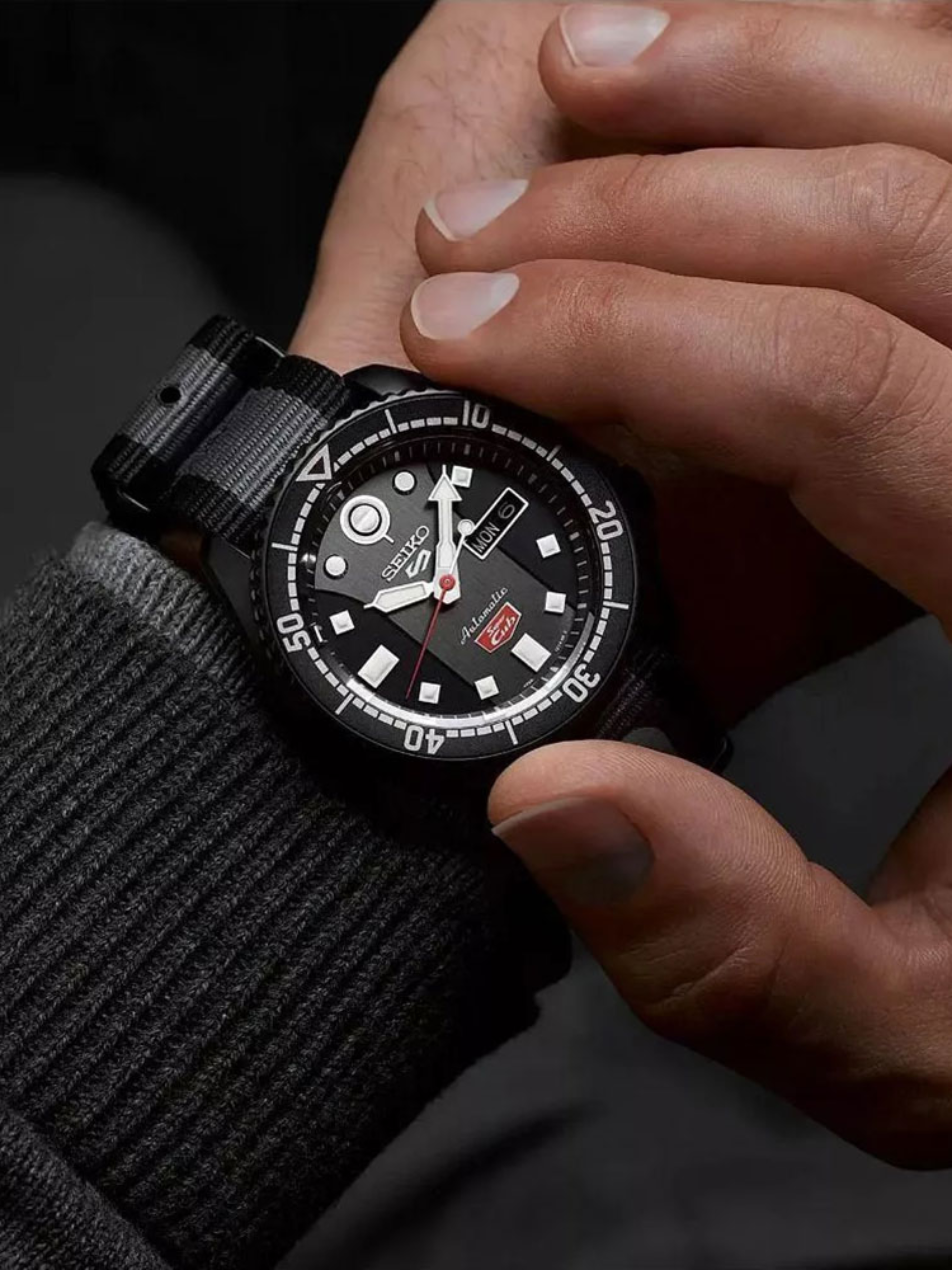 on-model-5 -Sports-Seiko- Honda -Super- Cub- Limited -Edition -“SKX -Sense- Style” -Automatic- Grey -Nylon -Strap- Black -Dial