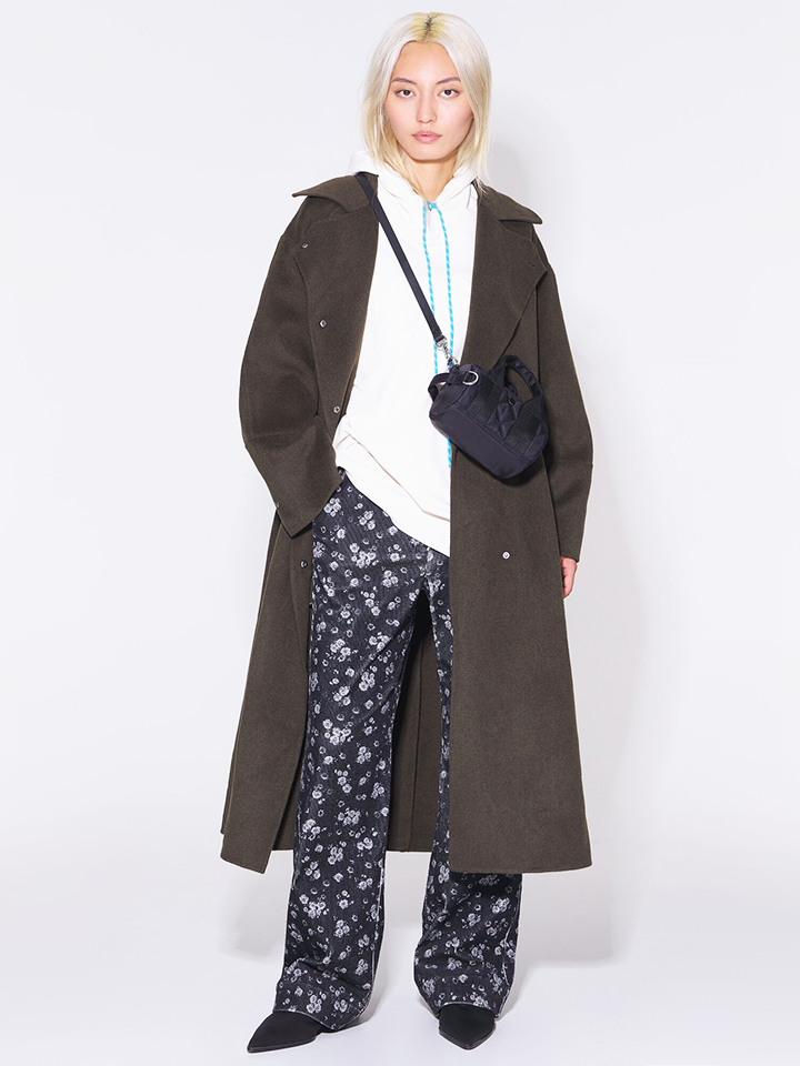 on-model-B-Y-L-Small-Padded-Black-Nylon-Barrel-Bag